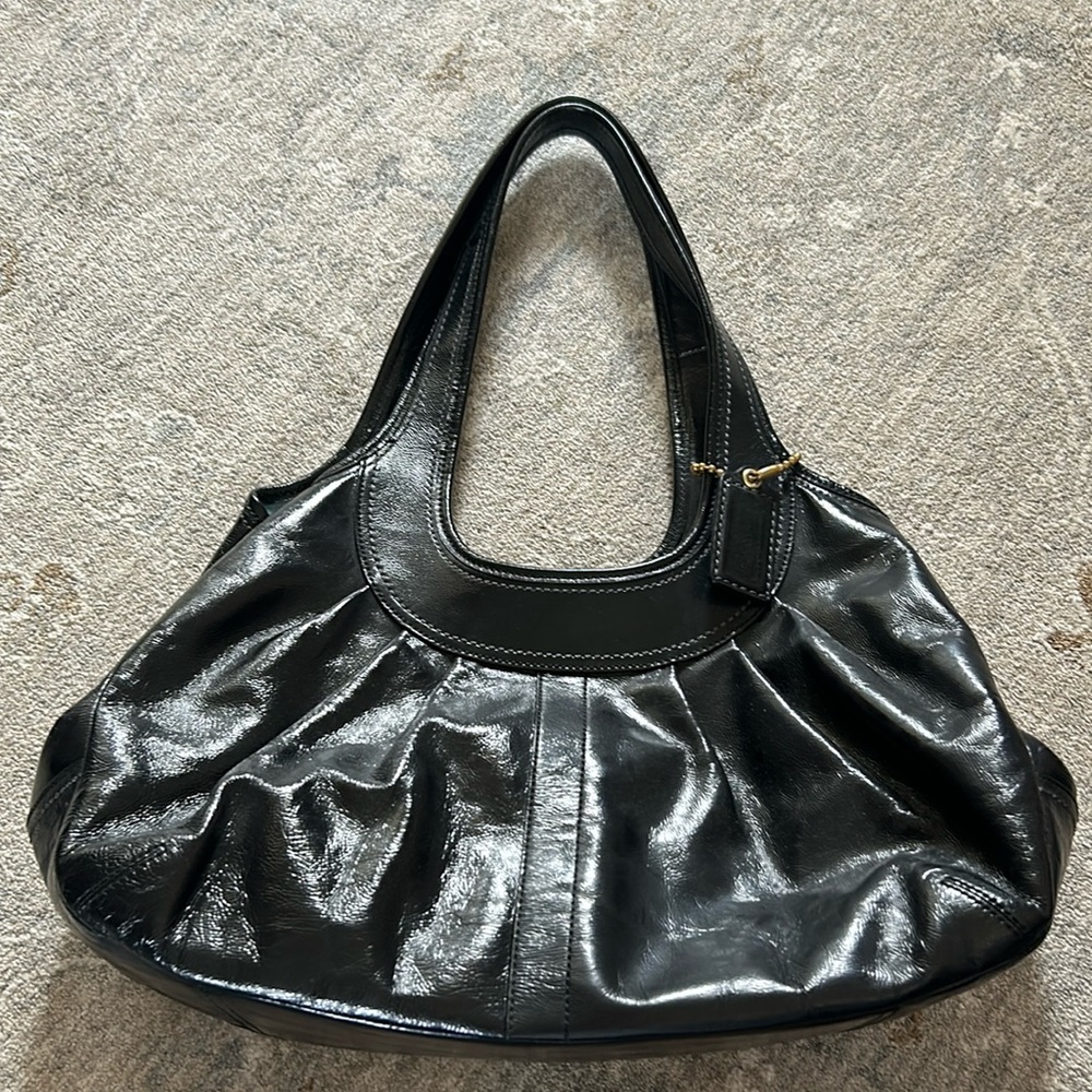 Vintage Coach purse w/dust bag. Black patent leather w/light blue lining.